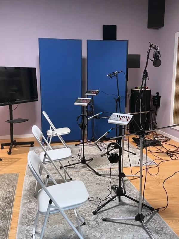 Music stands and microphones in Room A
