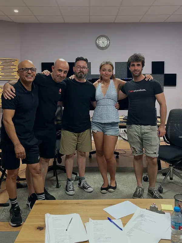 Team and artists in Room M